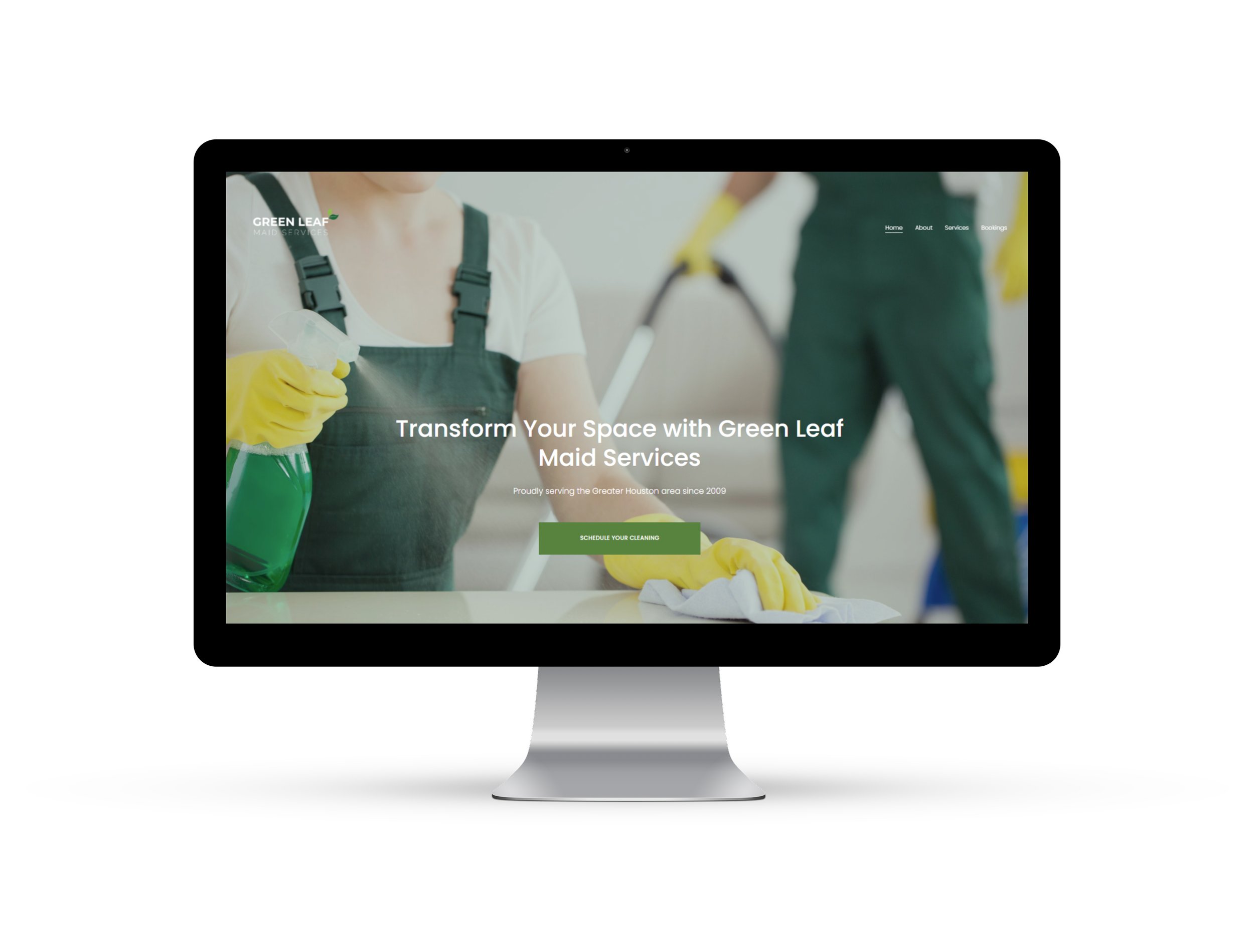 Computer screen displaying a cleaning service website with a person in an apron, holding a spray bottle and a cloth, with text advertising "Green Leaf Maid Services." The background includes a person vacuuming.