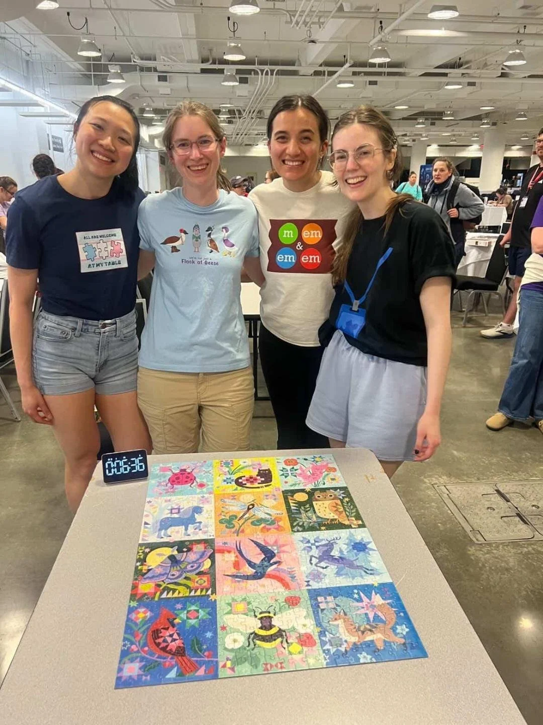 Nicole with Xin, Jasmine, and Emily after the teams round of the Quilted Critter's Final Run. They completed the puzzle in 6:36!