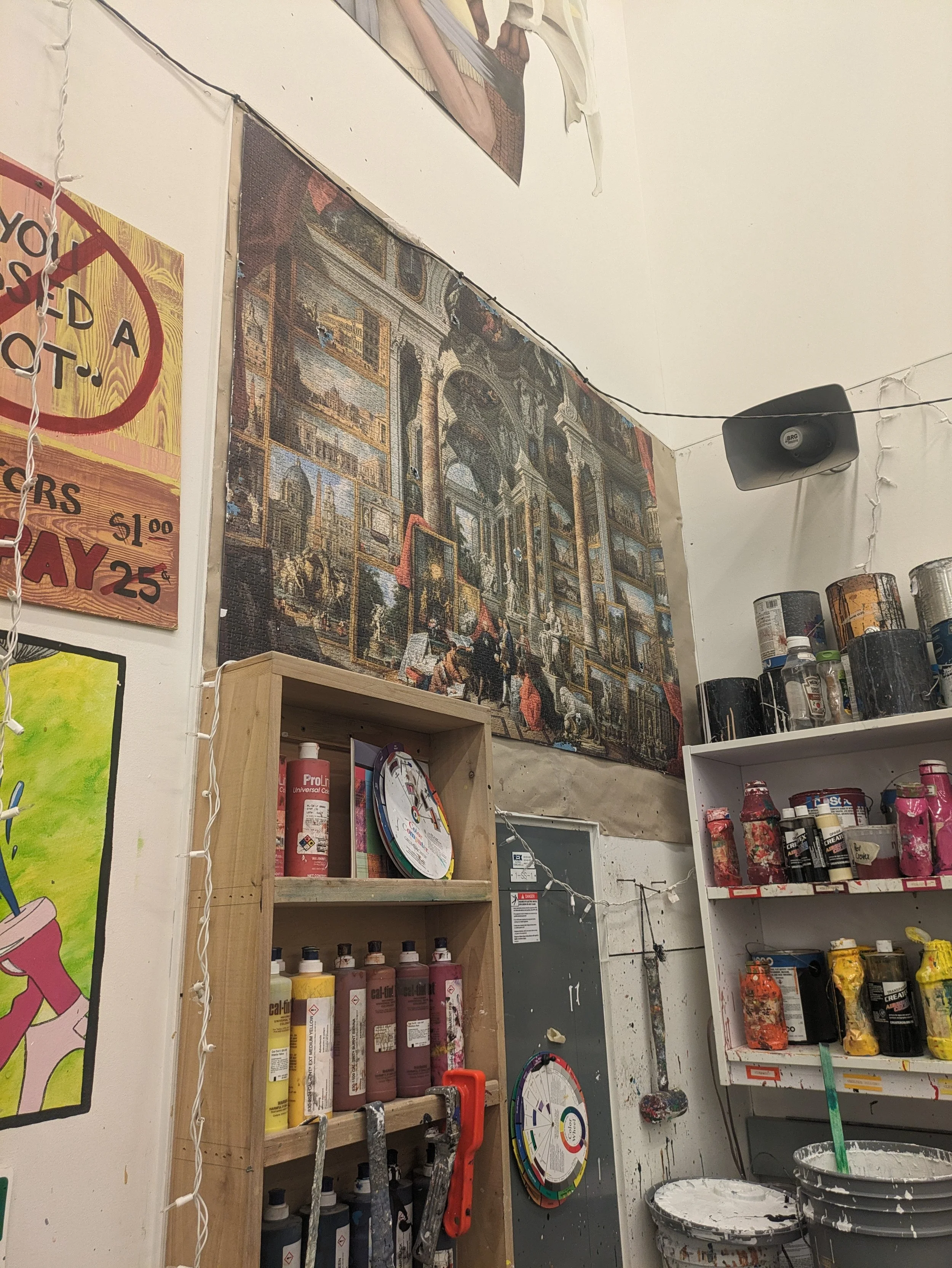 5,000 piece puzzle Lewis mostly did hanging up in his theater school's paint shop