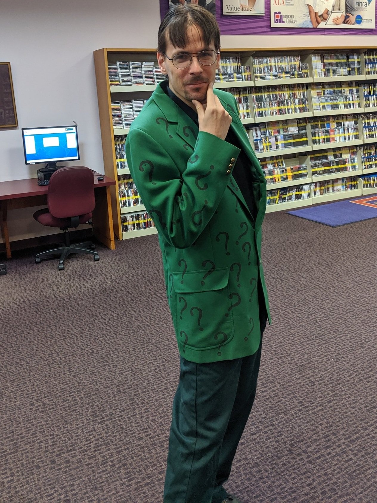 Kevin dressed up as The Riddler for Halloween at the library where he works.