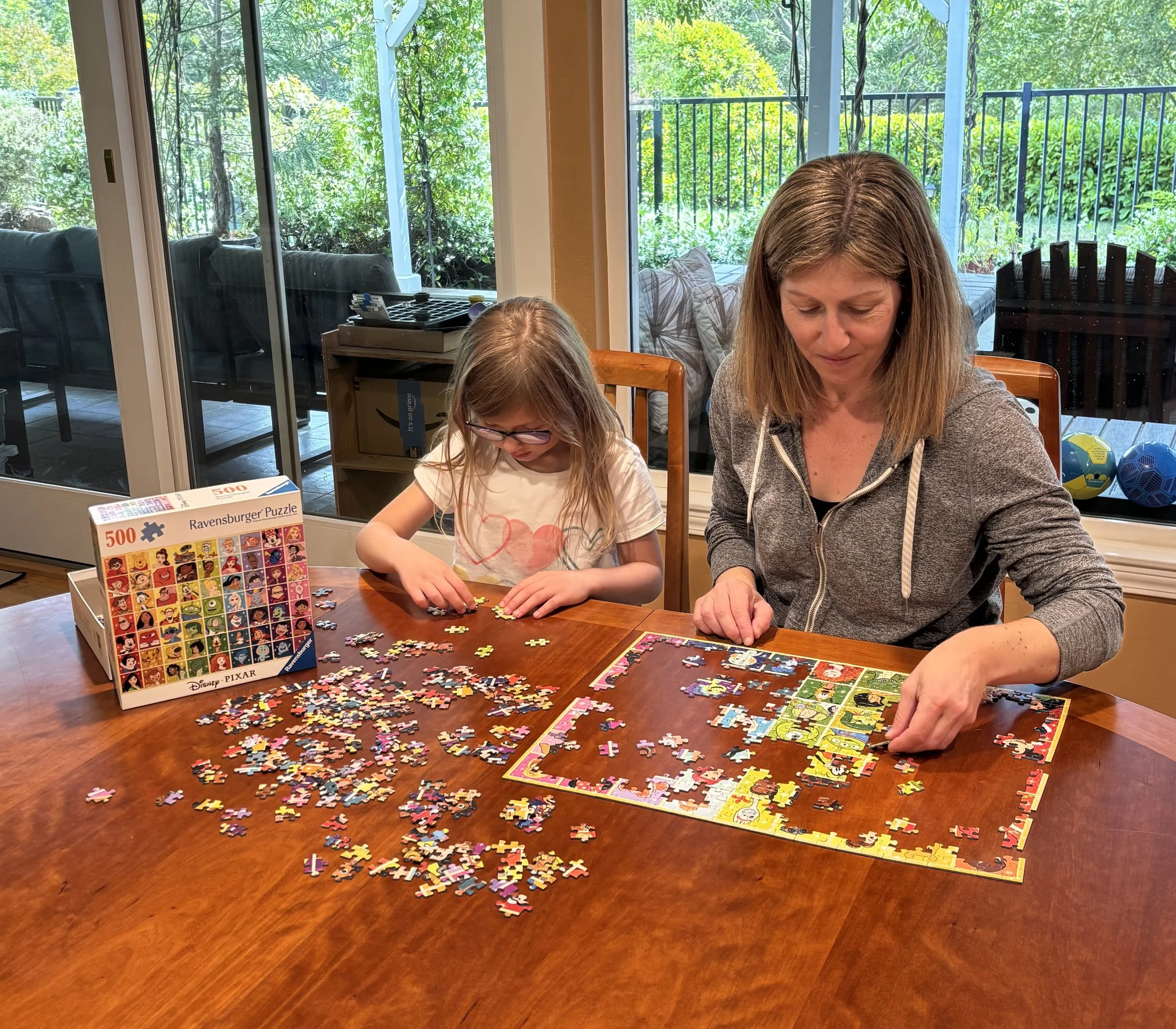 Puzzling at home with her daughter