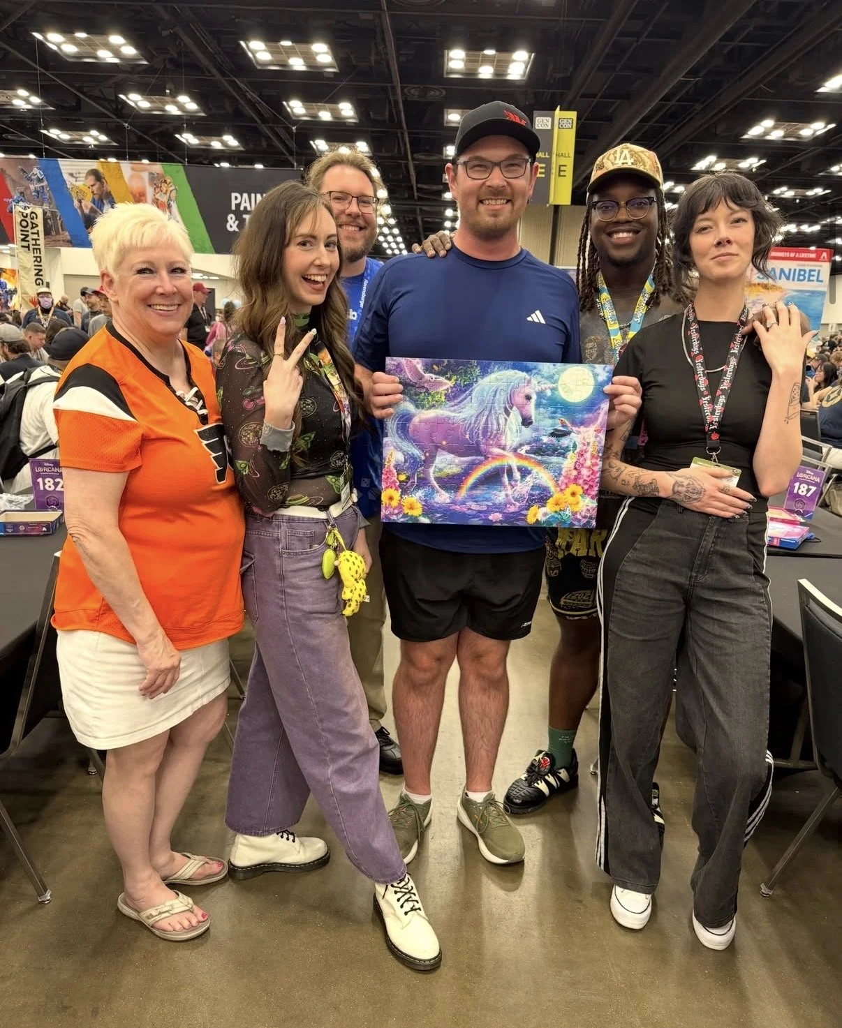 Nicholas (center) with (left to right) Joyce Pitkin, Magical Girl Melanie, Nathan B., Ify Nwadiwe, and Emily Louise at Gen Con 2026