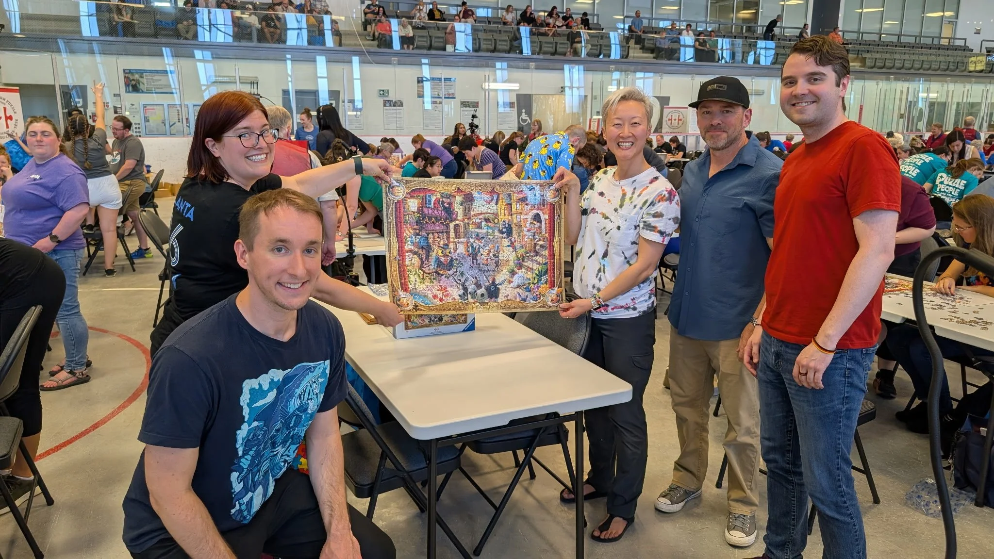 Cosmo S., Jessica R., Feifei, and Kyle K. finish first at 2026 Canadian Nationals. Pictured with illustrator Dean MacAdam (second from right).