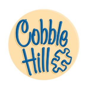 Logo for Cobble Hill with blue cursive text and a beige background