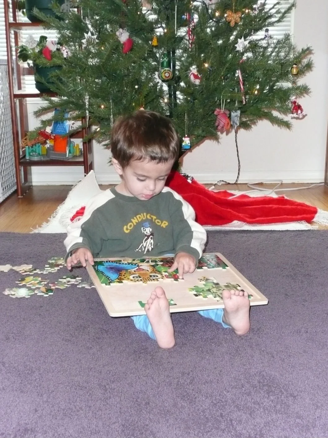 Lewis puzzling as a toddler