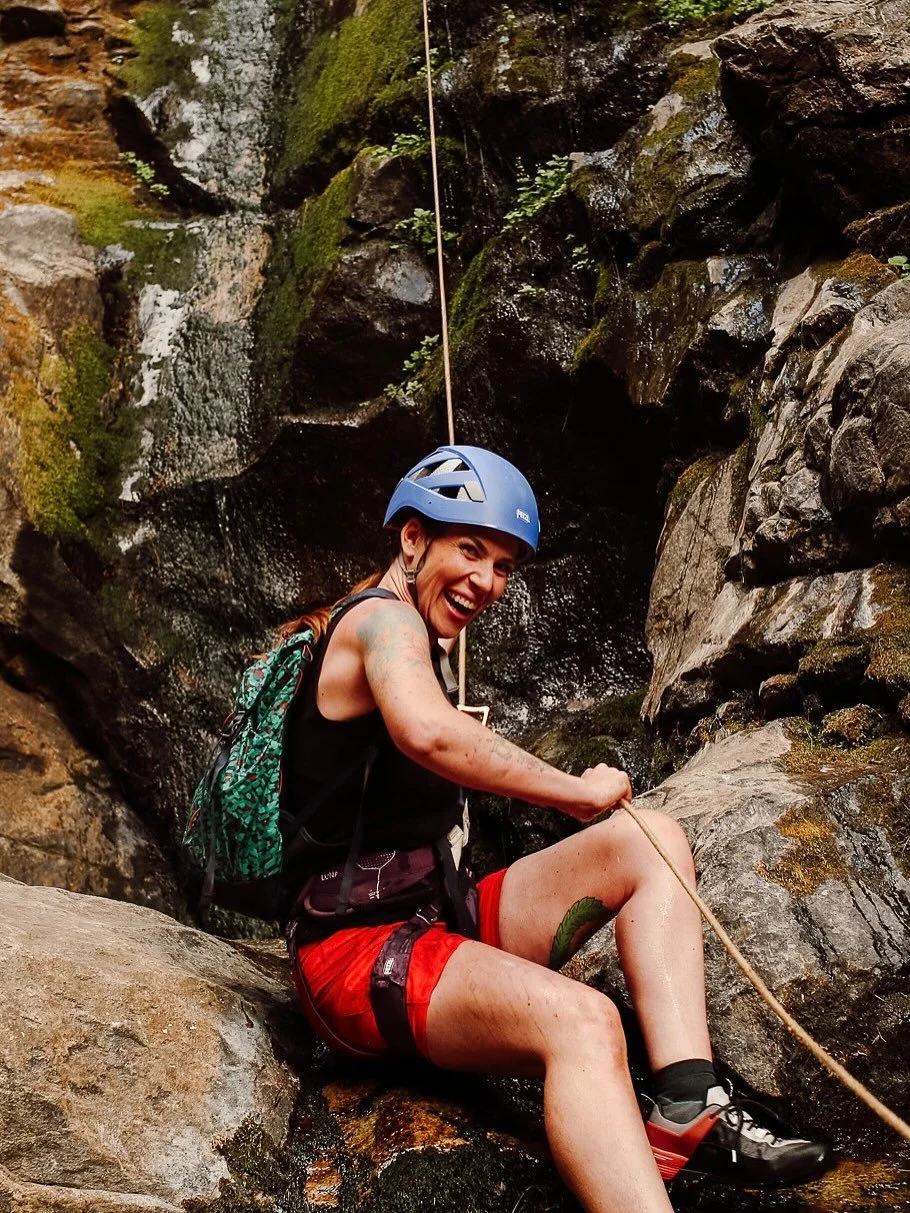 My favorite part of canyoneering with these Year of Adventure groups is watching all the women take care of each other. These women naturally take ownership of the person in front of and behind them. Sharing water.  Pointing out footholds. Stopping t