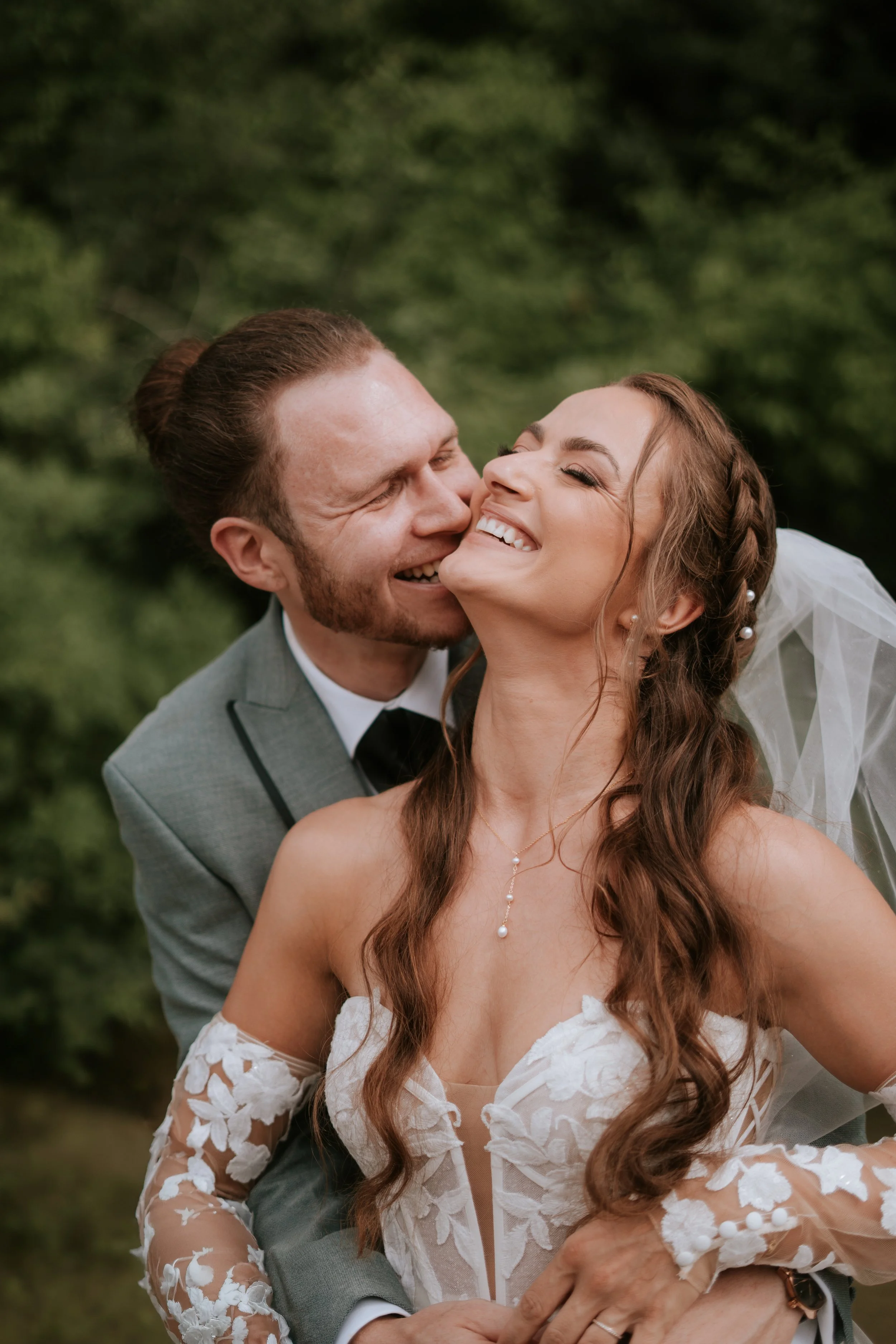 Slovenian couple giggling on a documentary candid wedding portrait session
