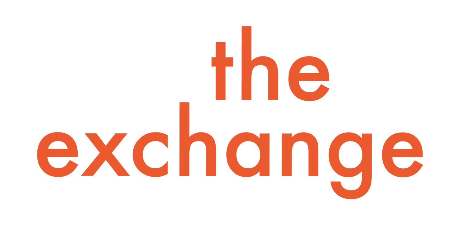 Text that reads 'the exchange' in orange font on a black background