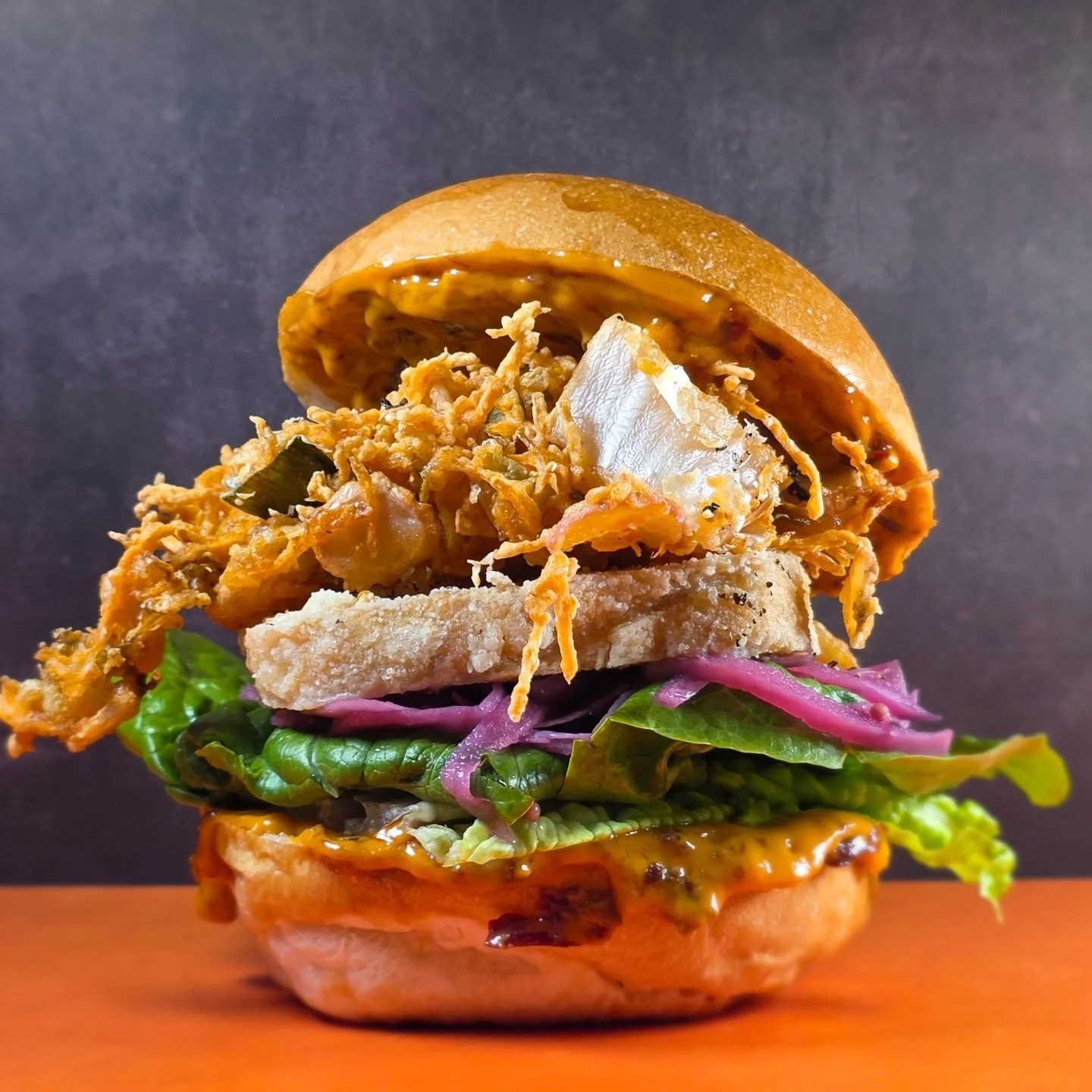 This is called the G.O.A.T bap for a reason 👀

Our signature Vegan Tofu Bap is a strong contender for the best party your tastebuds have ever experienced! 

What's in it? 👇 

&bull; Smoked Tofu 
&bull; Crispy Chilli Mayo
&bull; Fried Kimchi (omg) 
