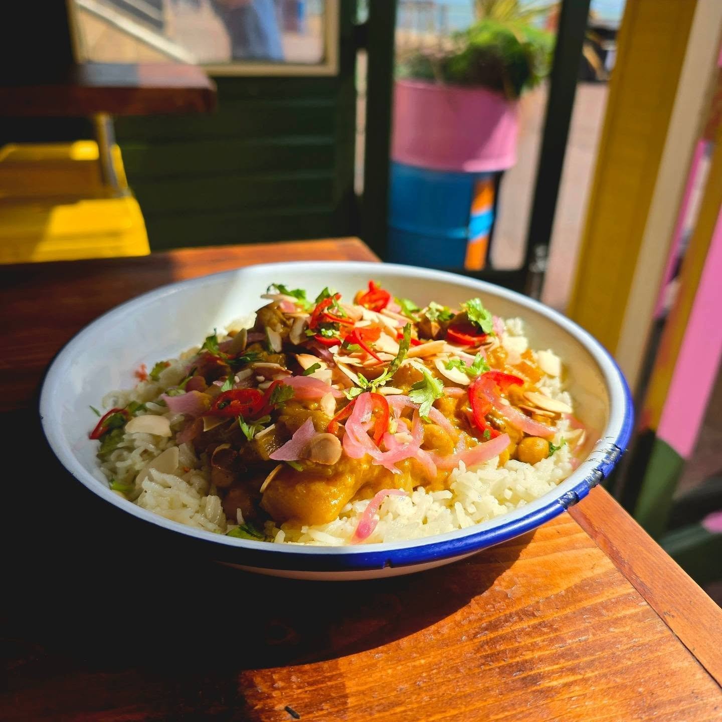 From the Fire: Wood-fired Chickpea &amp; Summer Squash Curry &amp; Garlic Rice (Vegan) 🌿

Available from 12pm Thurs - Sunday 🔥 

Endulge in tasty food by the sea - book now at goatledge.com/fireonthebeach 🔗

#fireonthebeach 
#woodfiredfood
#seasid