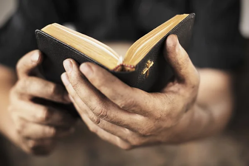 Open Bible held in hands representing Jeremiah 29:11 and God’s promises