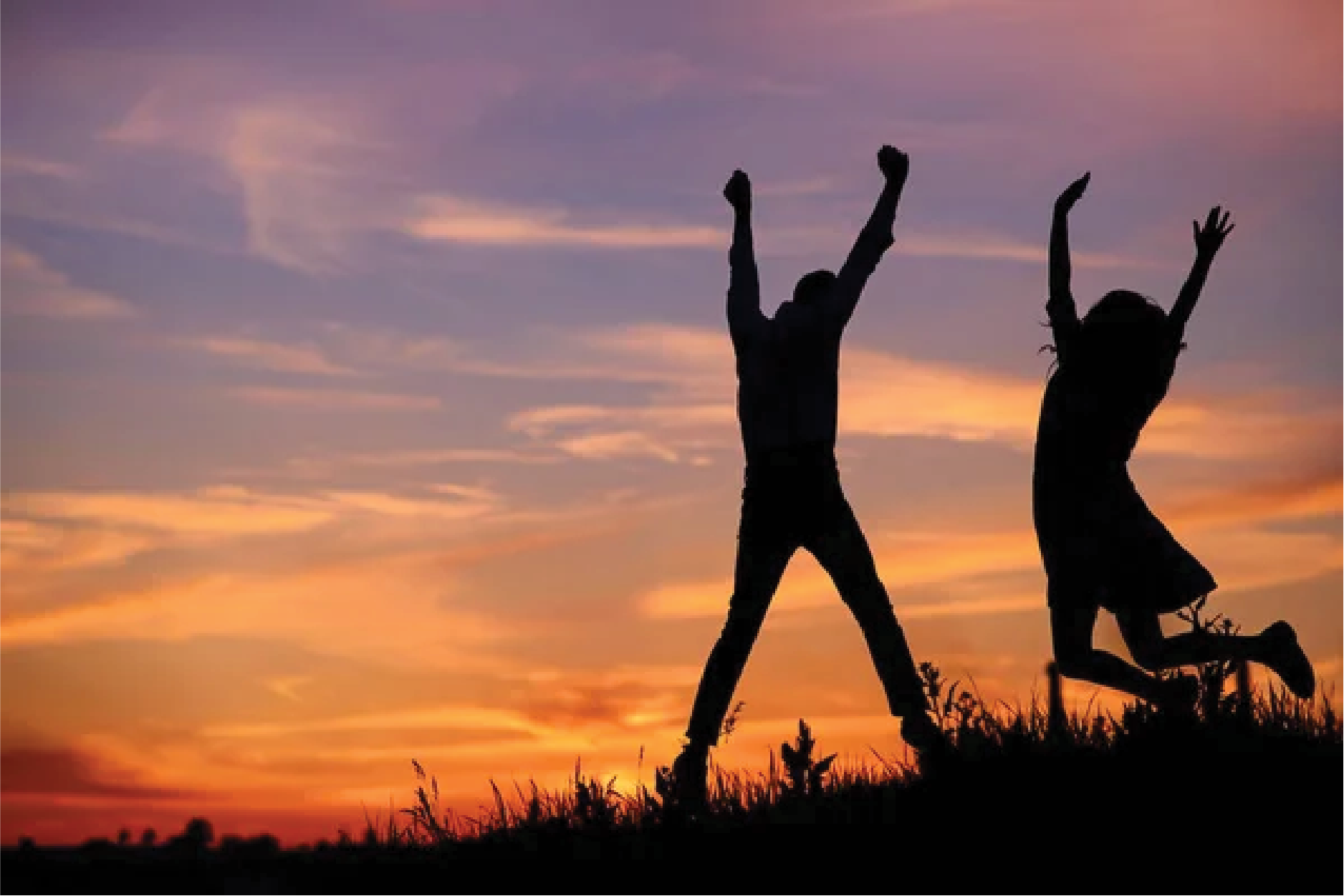 Silhouettes of people jumping in joy at sunset, expressing gratitude and praise