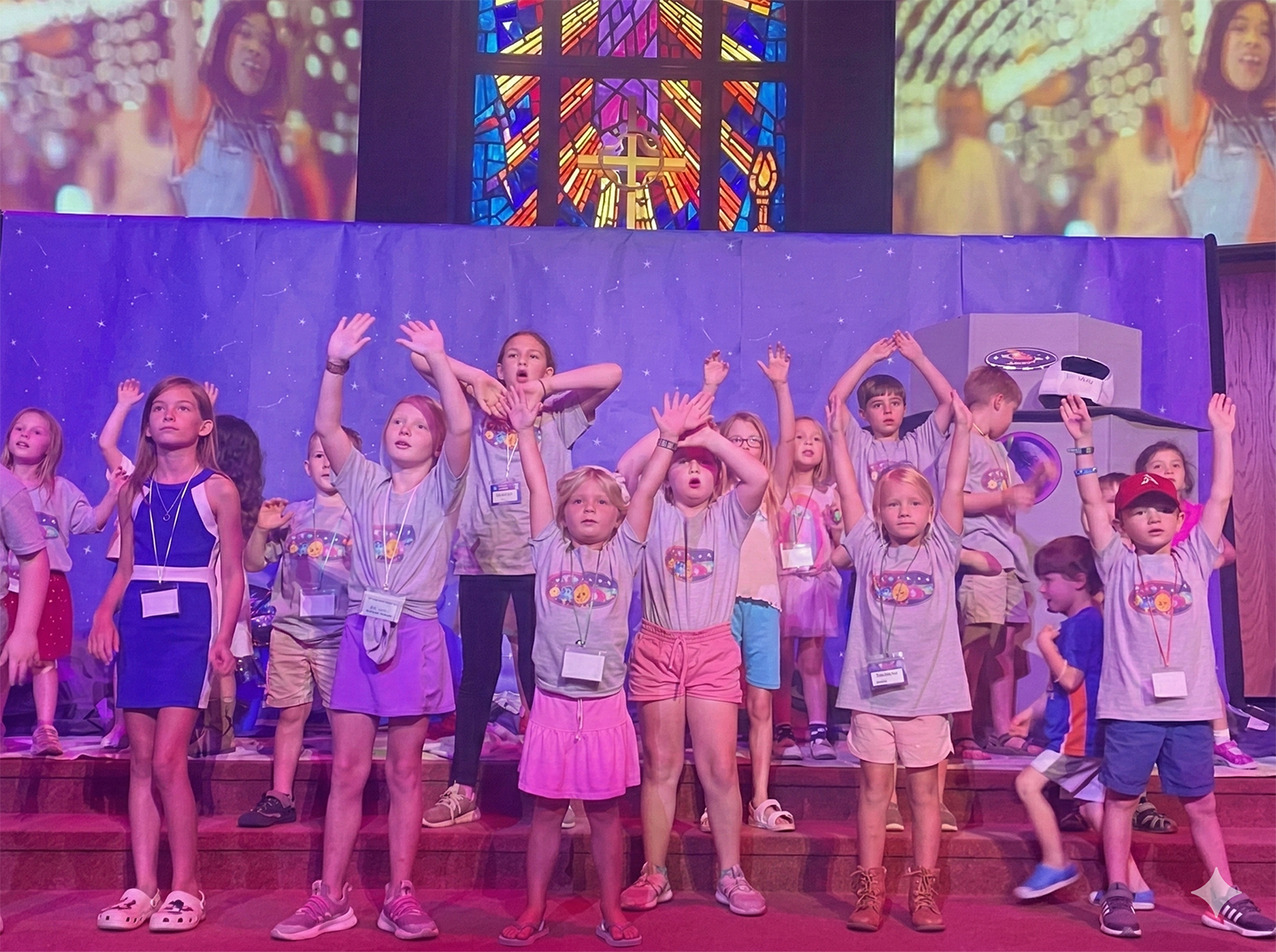 Children leading worship during a church event at Christ Little Rock Church