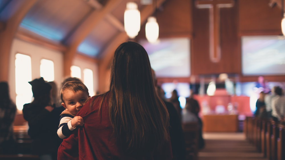 Family attending a church service together while discovering a welcoming Christian community and worship experience.