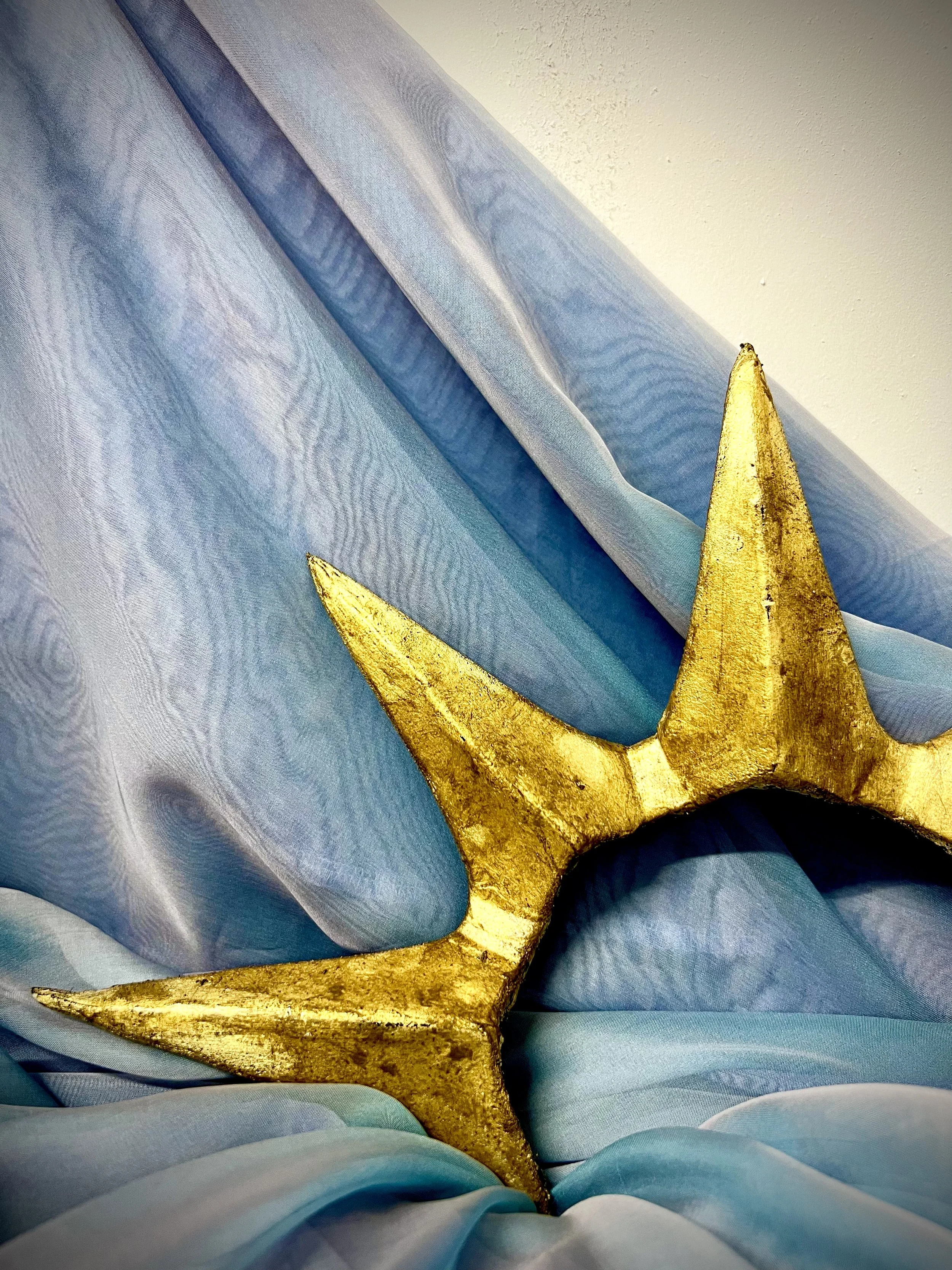 Gold leafed EVA foam distressed with acrylic