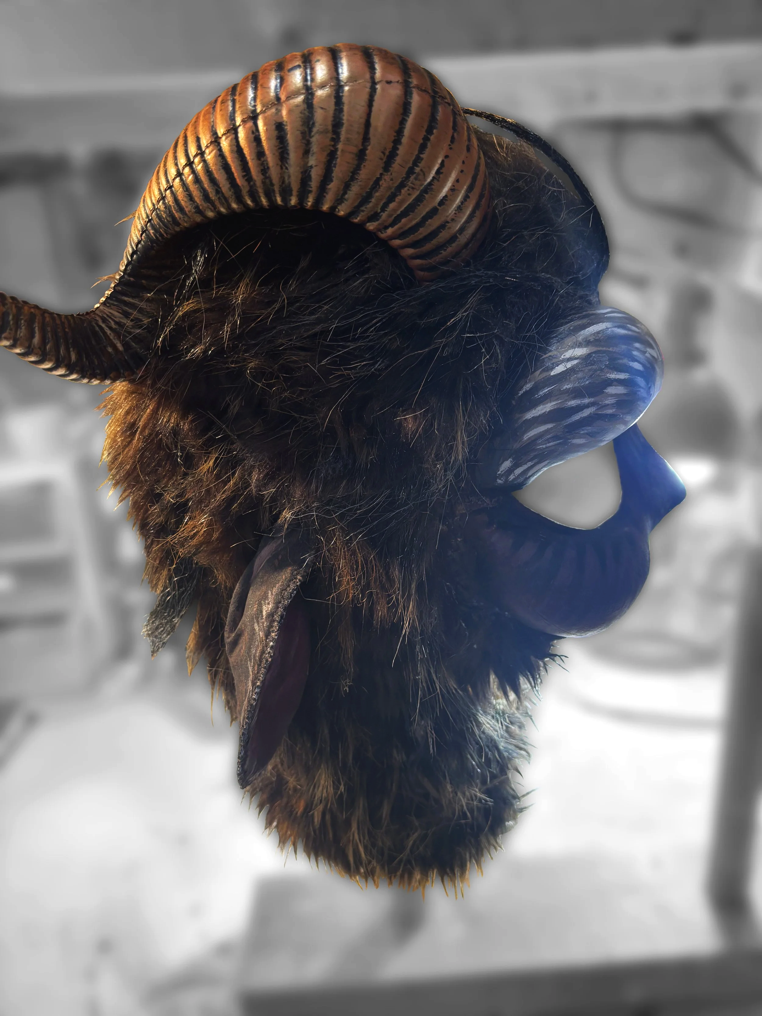 Hand painted faceplate and ears with acrylic paint; horns refigured attached 