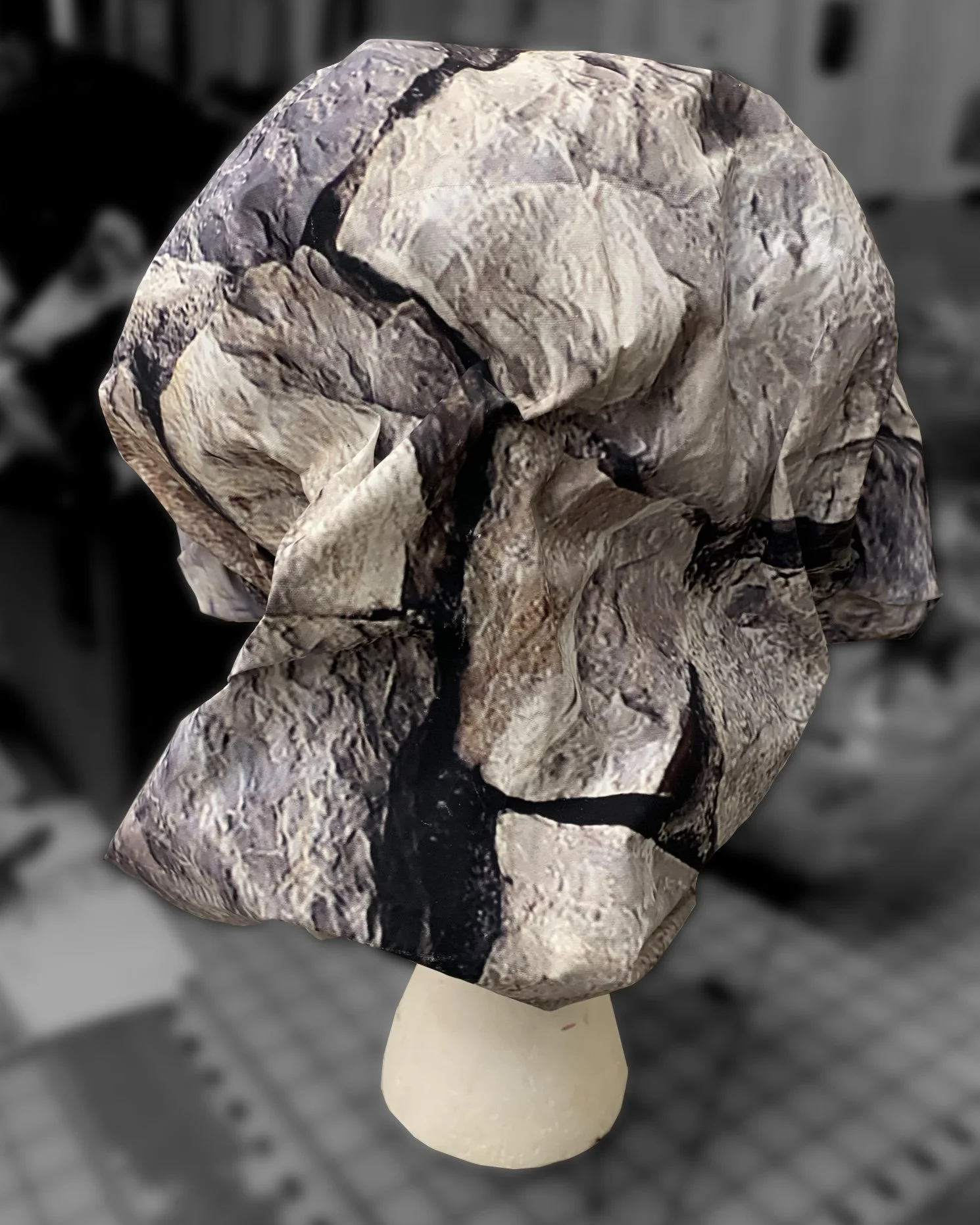 Rigid vinyl fabric holds shape when scrunched