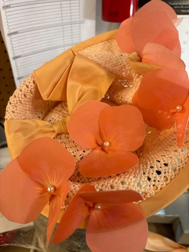 Straw, taffeta bow, painted fused silk, pearl beads