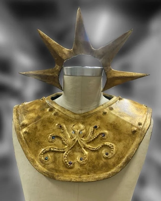 Gold leafed EVA foam with foam clay detailing, embellished with Swarovski crystals, distressed with acrylic