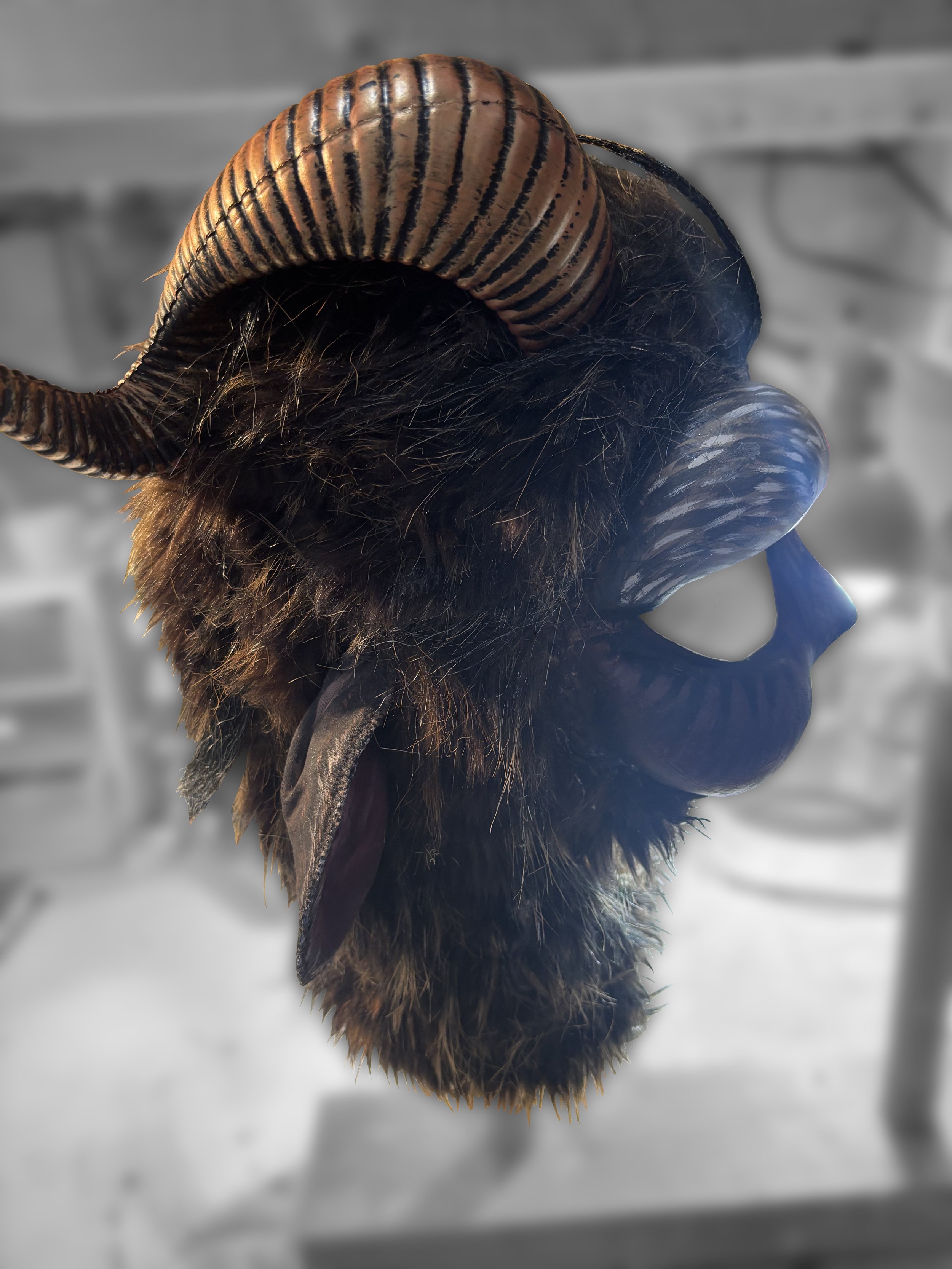 Hand painted faceplate and ears with acrylic paint; horns refigured attached 