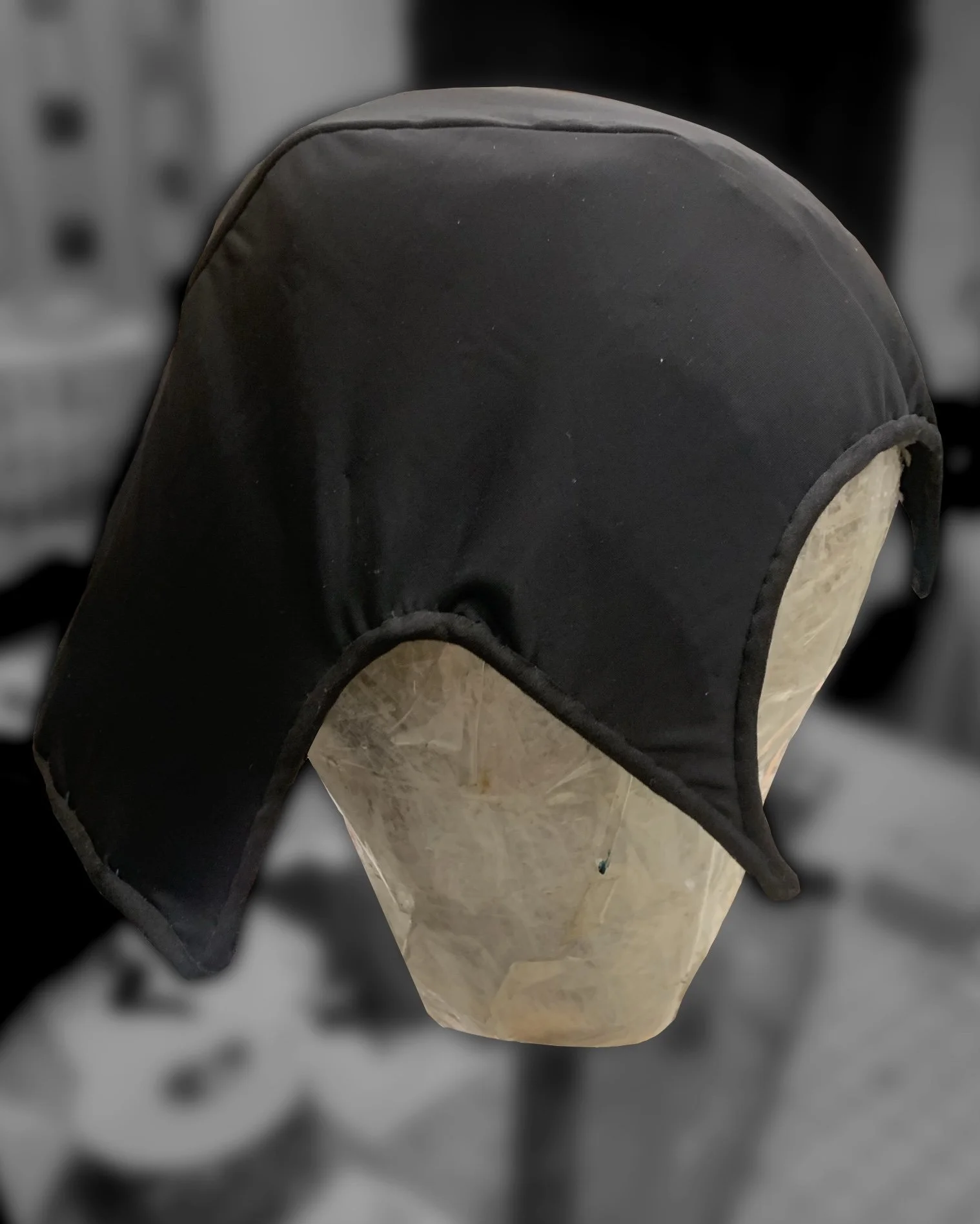 Covered in spandex and brim lined with bias tape