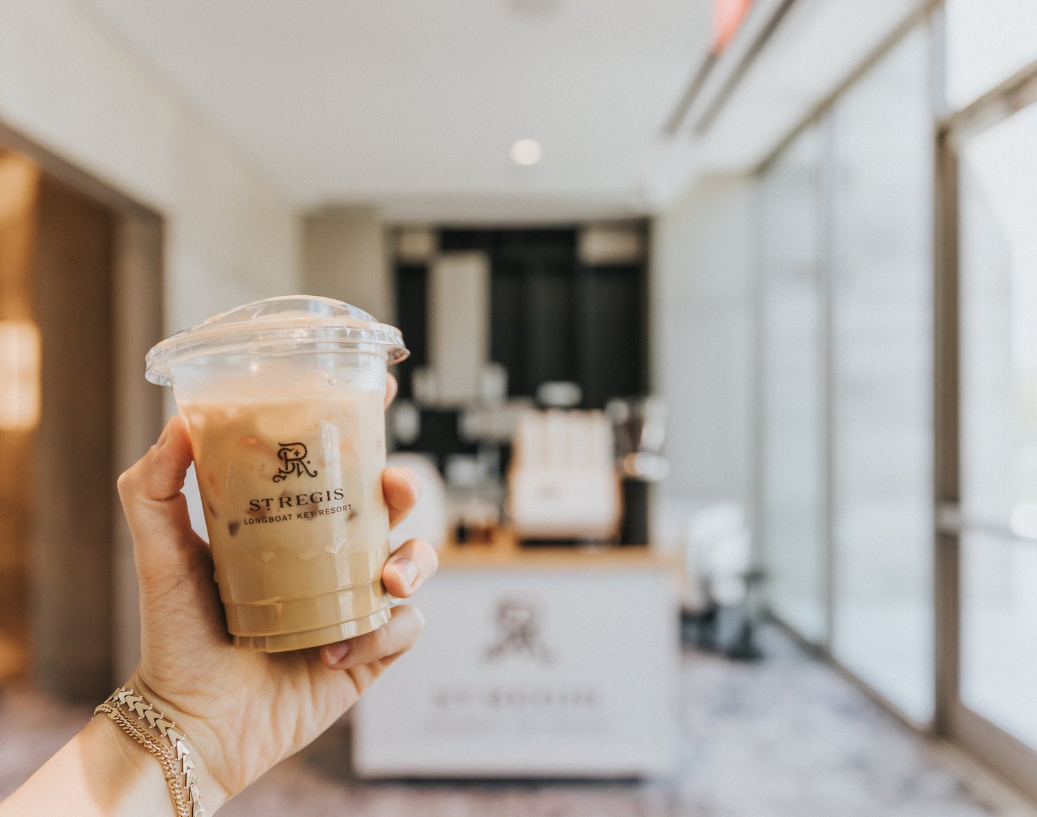 Custom branded iced coffee at a St. Regis resort event by Reform Coffee