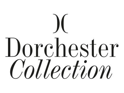 Dorchestor Collection logo with stylized lettering and emblem.