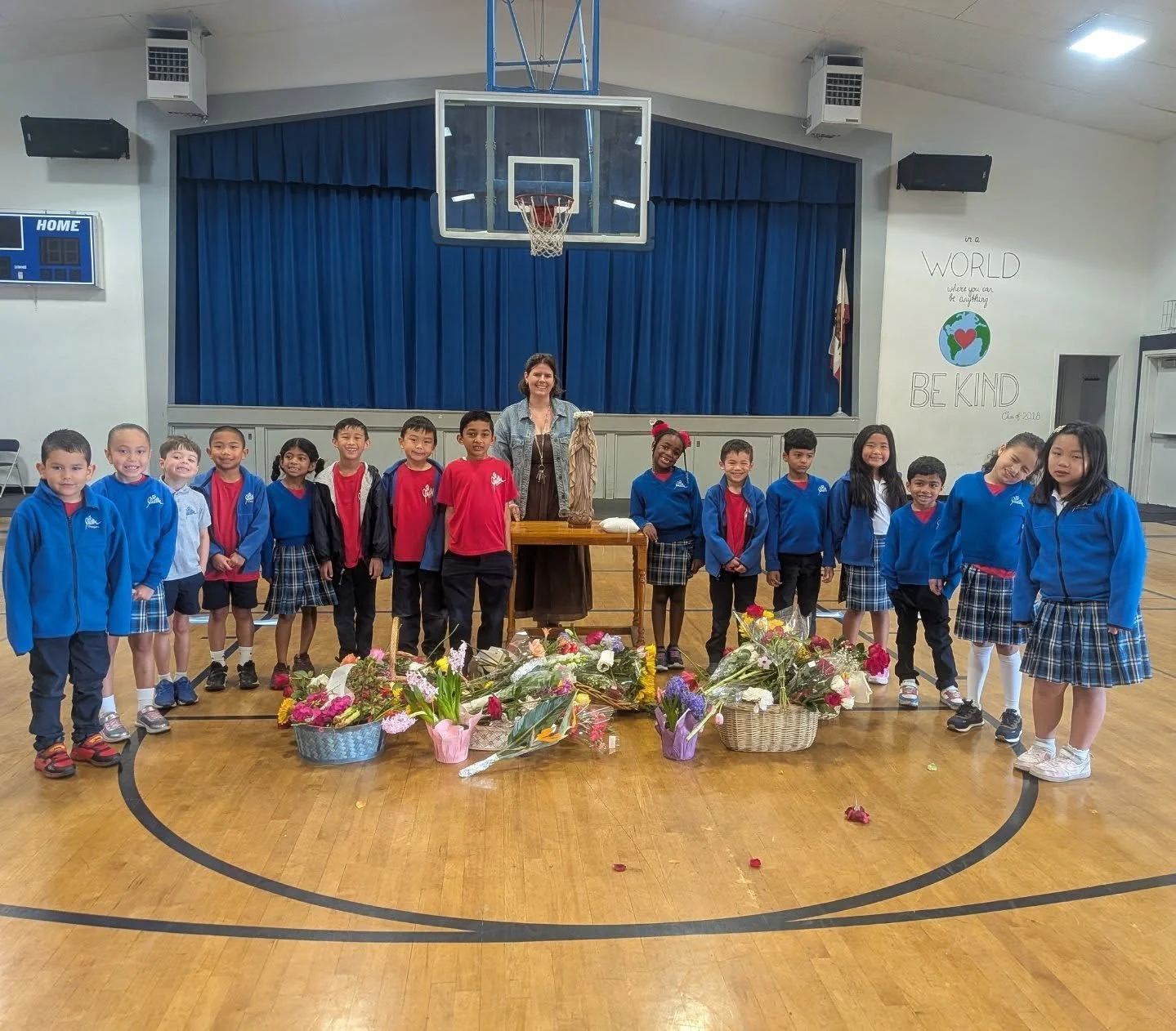 Today our first graders led us in a beautiful and heartfelt May Day Prayer Service honoring Mary. 🌸💙

Our entire school came together in prayer and processed reverently while each student carried a flower to place before Mary. It was a wonderful re