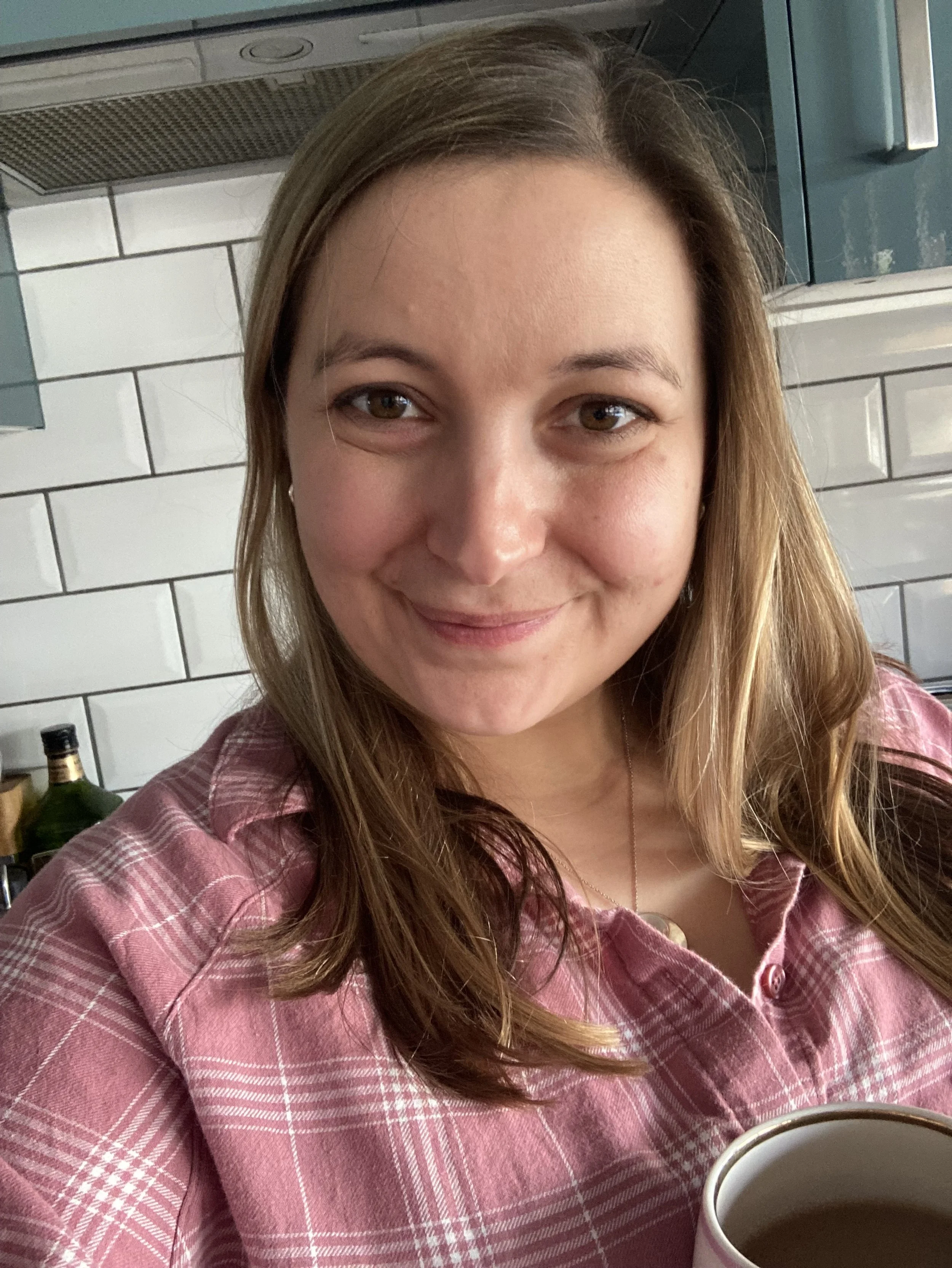 Emily having a tea break between coaching clients