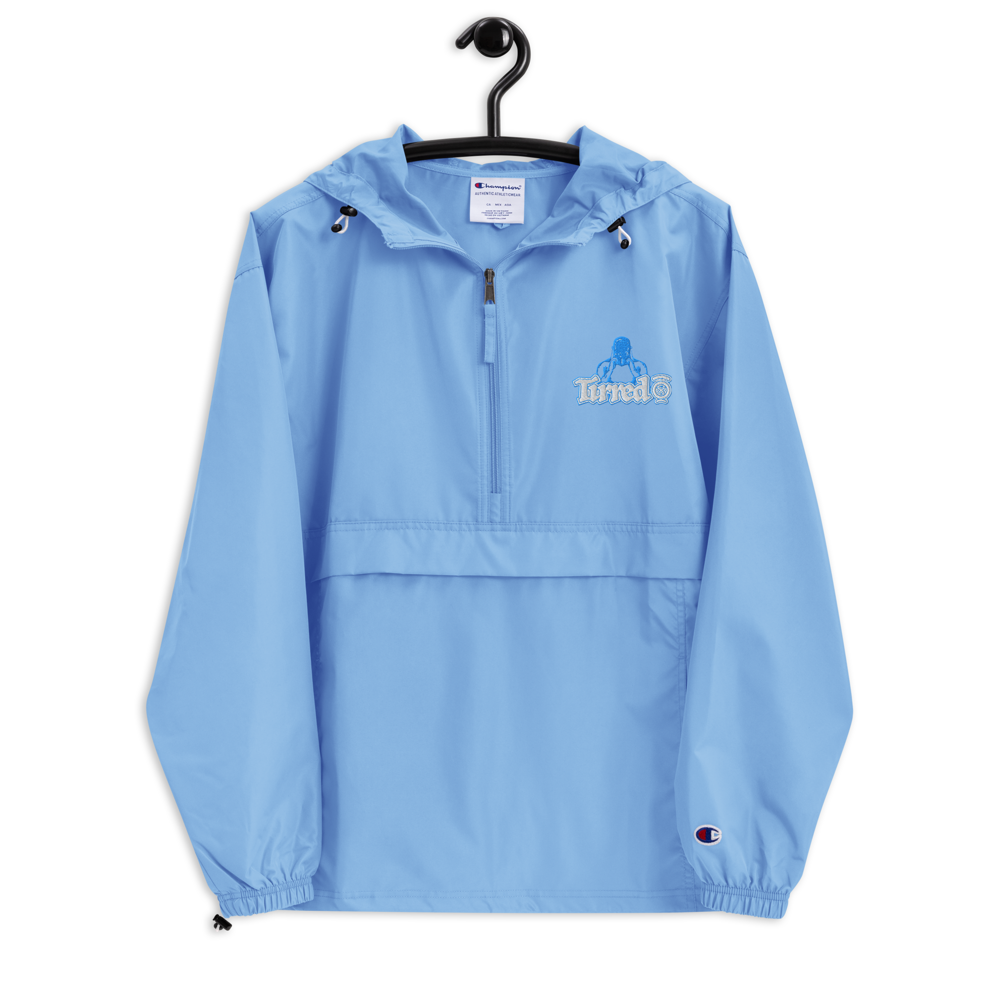 embroidered-champion-packable-jacket-light-blue-front-693242e82a5ad.png