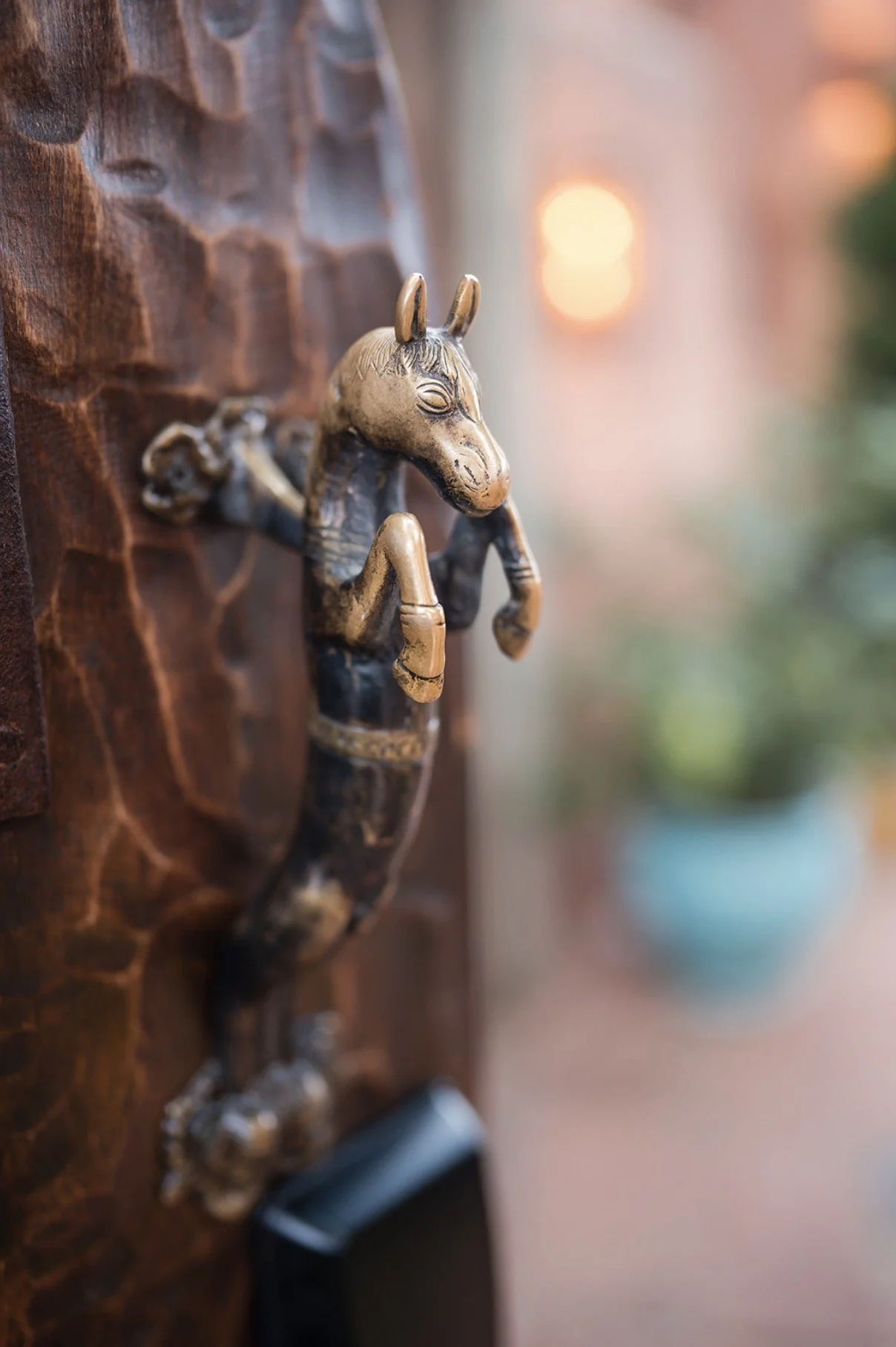 bronze horse door knocker Pink Adobe Santa Fe architectural detail event photographer Casey Addason