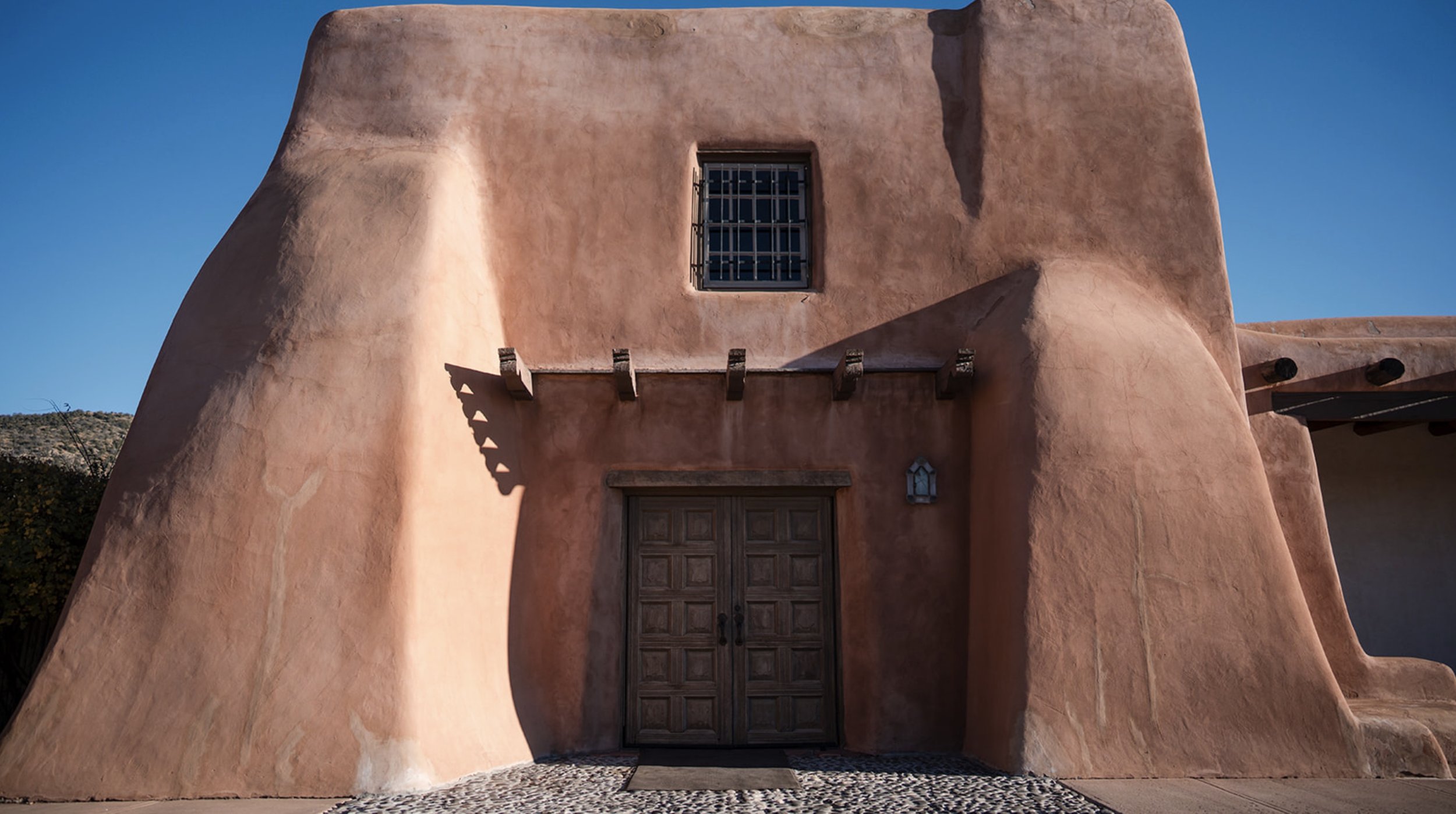 Museum Hill Santa Fe adobe architecture wooden doors wedding venue fall