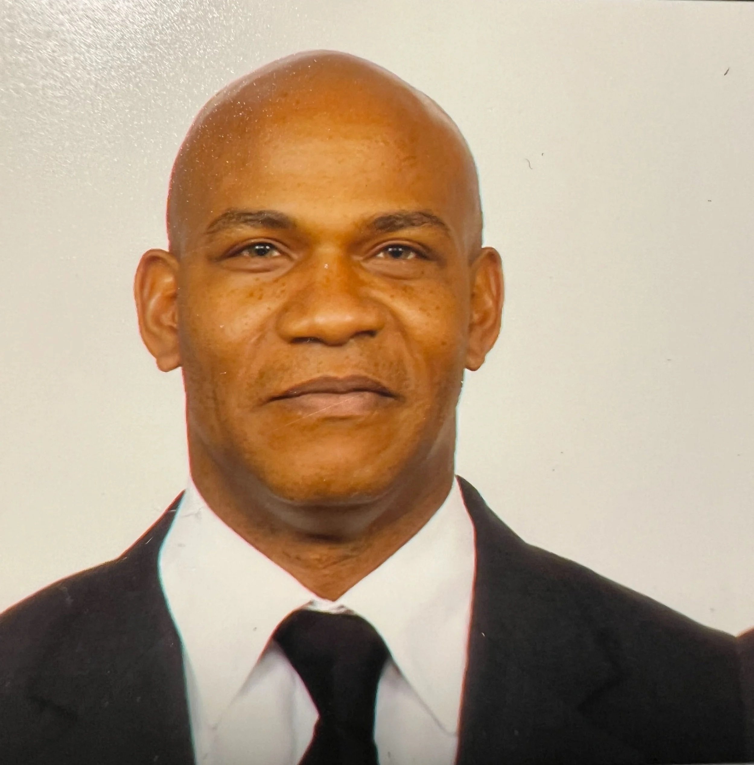 Tim smiling at the camera