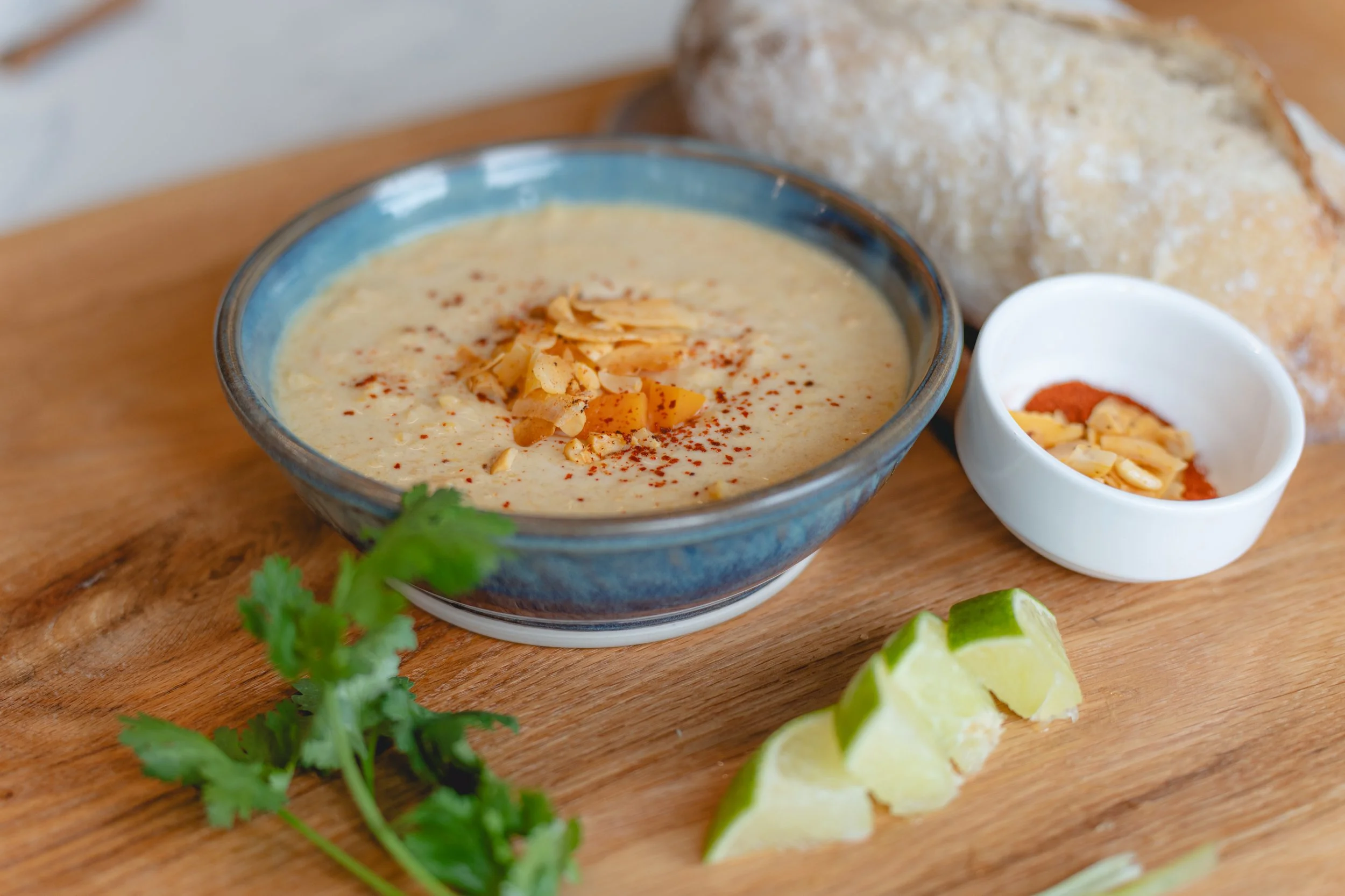 Green Curry Butternut Squash Soup. Features bright, flavor packed green curry with sweetness from coconut milk and butternut squash. Made by Oh Soup!