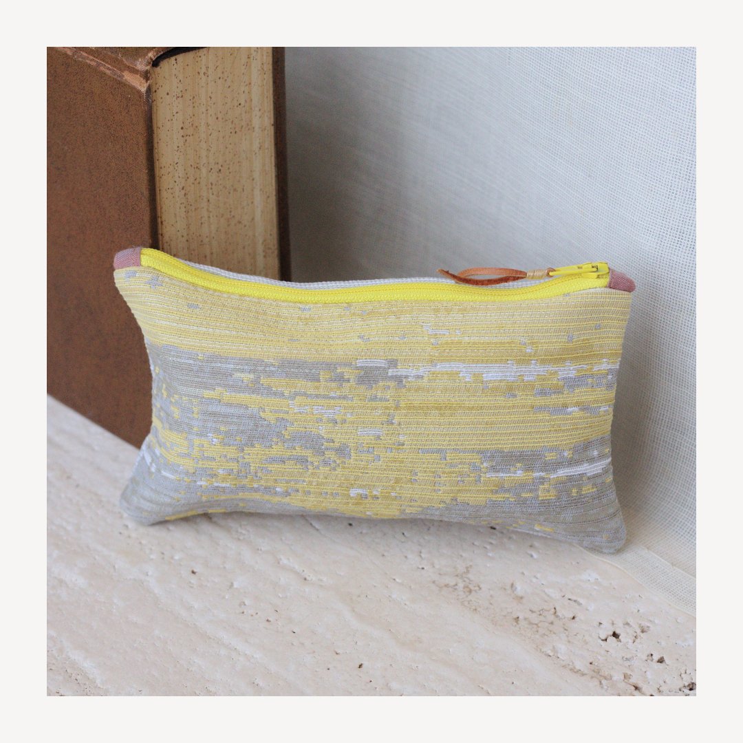 These one-of-a-kind zipper pouches are made from commercial grade upholstery samples (many of which have stain and moisture resistant finishes), and they can hold just about anything - from makeup or pens to miscellaneous items and cords.

Small Zipp