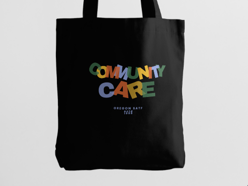 Community Care Black Tote Product Photo Close-Up.PNG