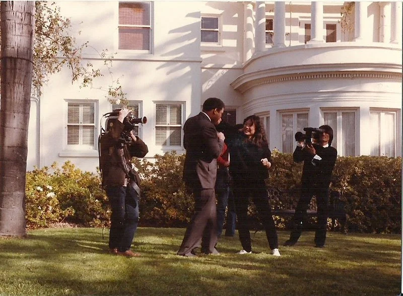 Janet with Muhammud Ali on set of East to West