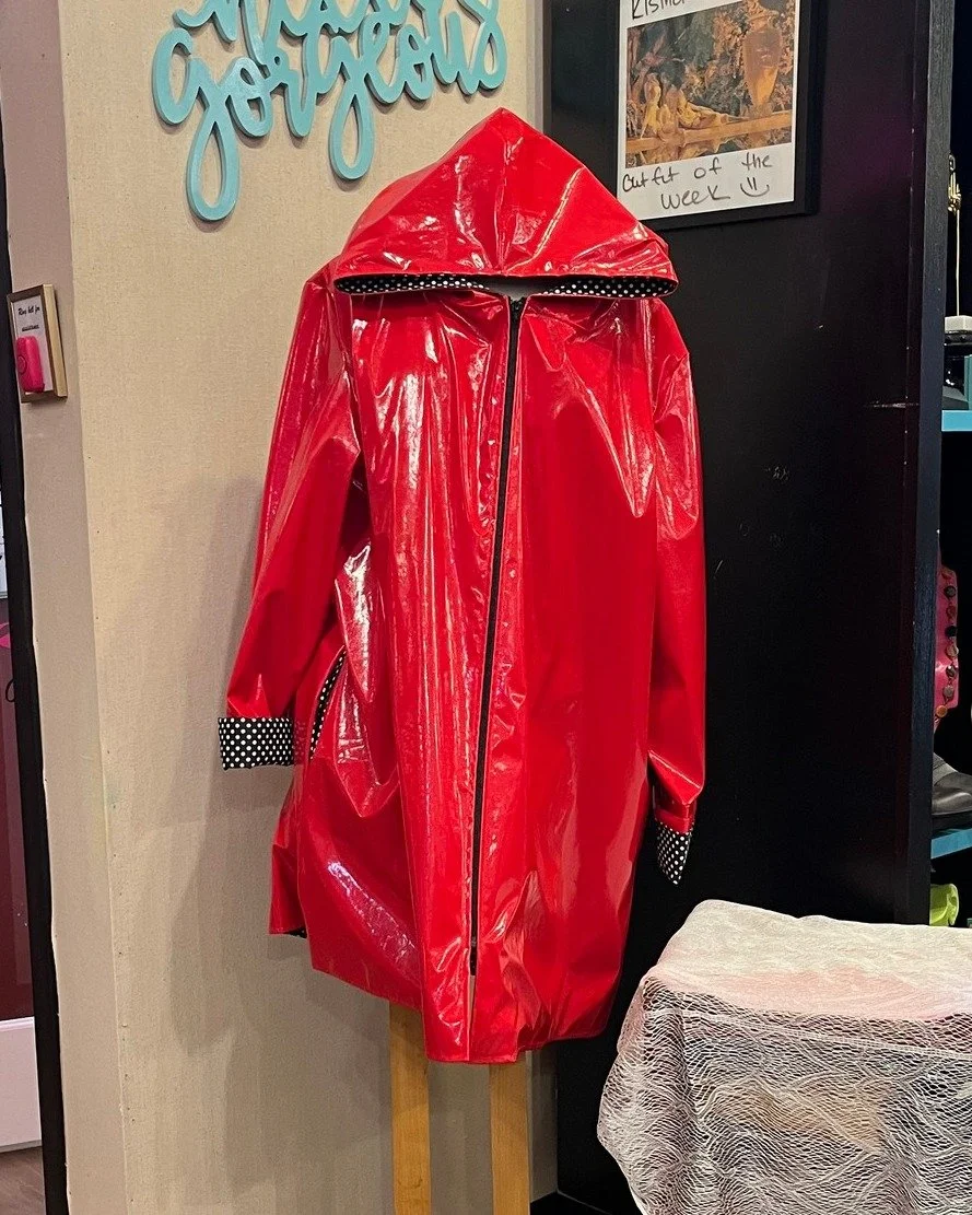 Happy Thursday! In honor of the wet weather we've been having, we styled this adorable raincoat today. Such a fun bright red and peekaboo dotted lining. Thanks to Connie, Danielle, Jordan, Mariah, and Gabe for styling! #kismet #kismetconsignment #kis