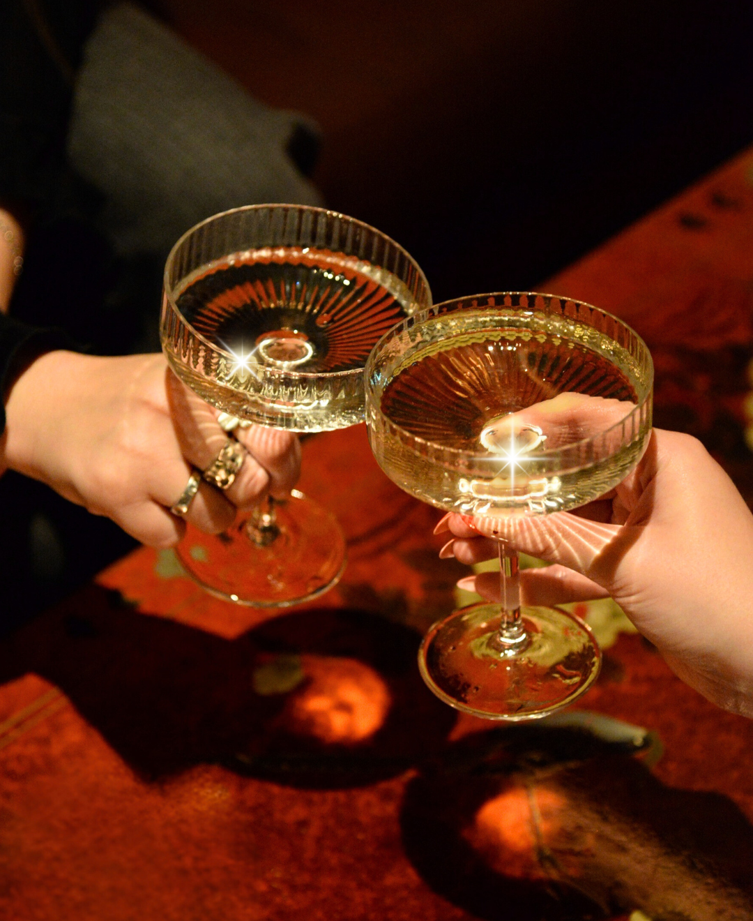 : London nightclub DJ and dance floor at Lucy Wong with guests enjoying late night music