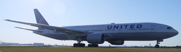  A United Airlines Boeing 777-200ER taxis to runway 34L in Sydney. The 777 replaced the 747 on the US-Australia routes as of 01 April 2014. The trans-Pacific route is one of the world's longest routes and demands a careful balance between fuel and payload. 