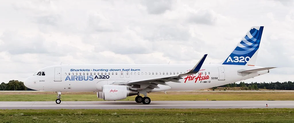  Back in 2009, Airbus introduced the Sharklet. This innovation served to reduce wingtip vortices which form when the air from the top of the wing meets the air under the wing and creates a whirlwind effect. This serves to create drag which inhibits the forward movement of the aircraft through the air. By reducing that drag, the aircraft requires less energy to push it forward thereby reducing fuel consumption and emissions. 