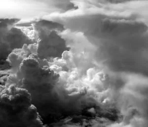  What causes turbulence? As the day heats up, warm moist air rises and creates unstable air as it mixes with cooler drier air above. This creates up-and-down draughts that can be quite violent. 
