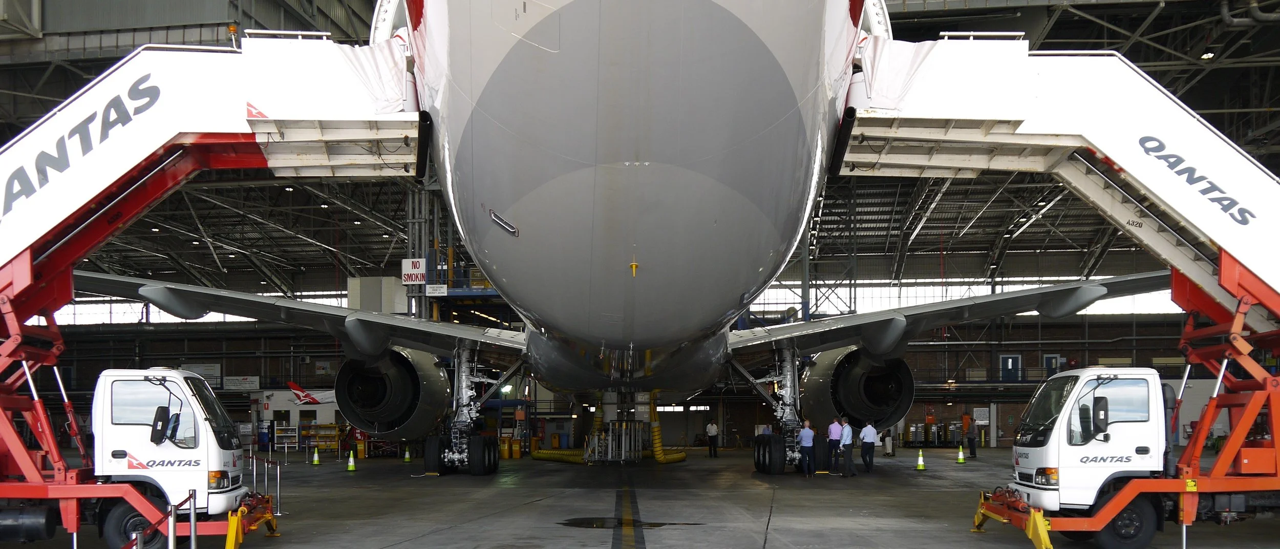  Under the Boeing 777 tail looking forward. Less than a month old and this American Airlines 777 was as shiny as a new pin. 