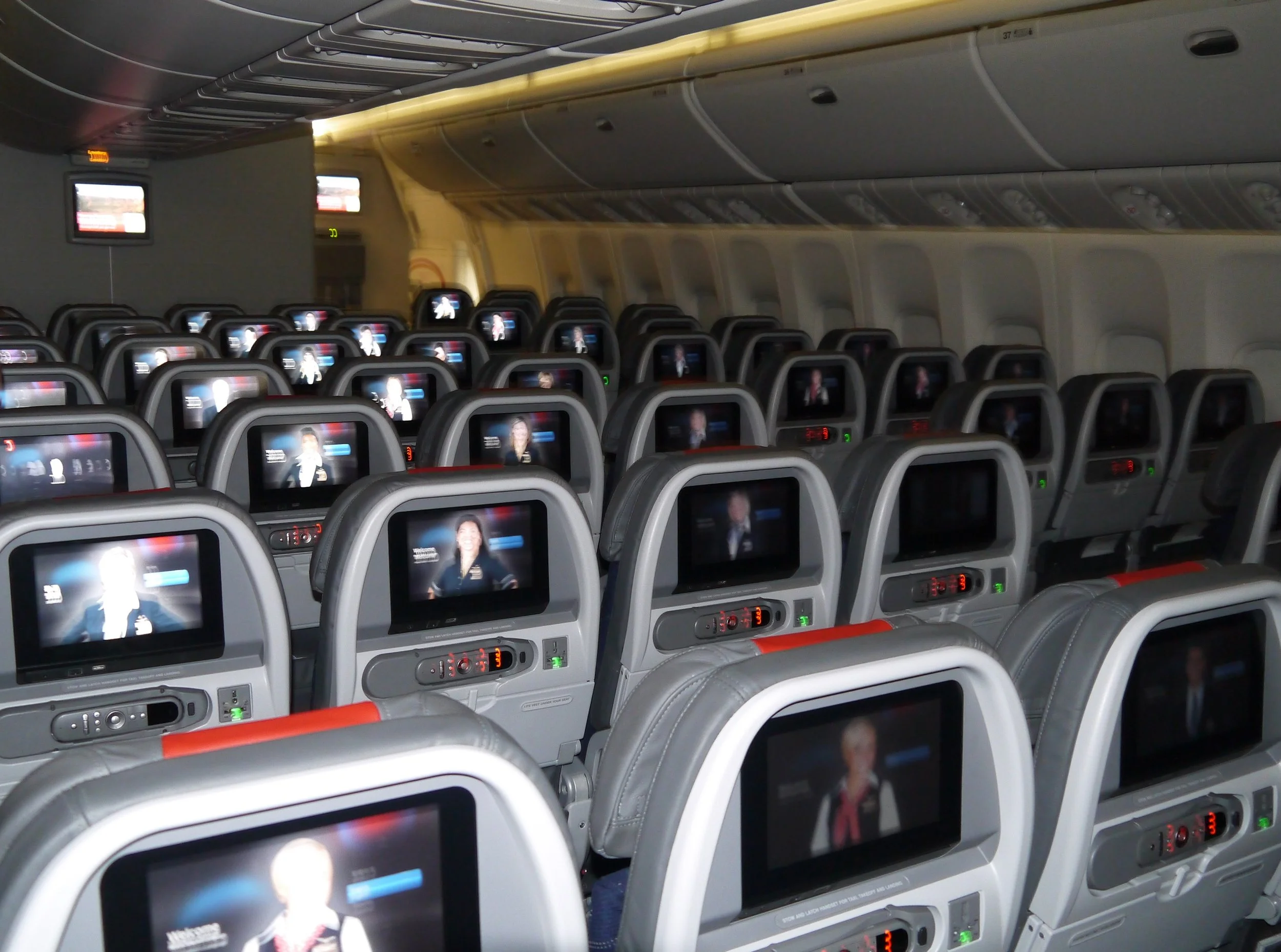  American Airlines Boeing 777 300ER Main Cabin. Seats are in 3x4x3 configuration. 