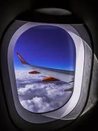  An airliner window showing a rounded shape which we are very familiar with today 