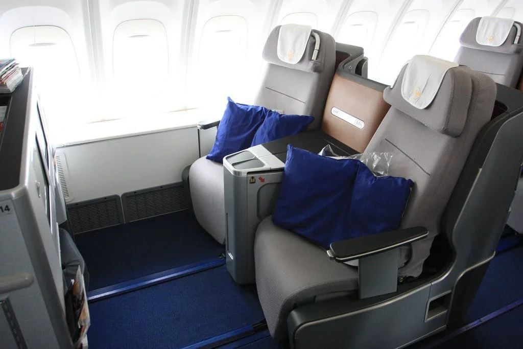  The modern business class seat is designed to be everything to everybody. A seat, a bed, an entertainment theatre. But what about the plebs down the back who can't afford the price but still need to survive an 18-hour flight? 