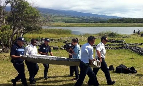  The Malaysian Airliners Flight 370 flaperon is taken away by authorities on Reunion Island to be sent to Toulouse France for investigation. 