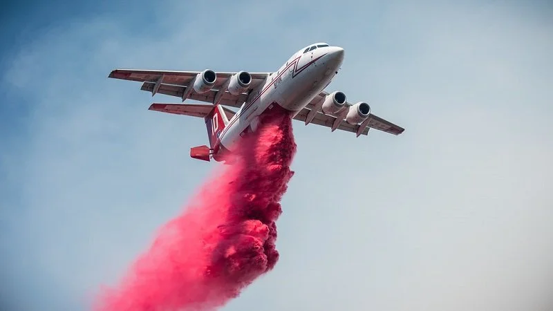  This  BAe 146  aerial firefighting aircraft is ideal for its slow-speed abilities. Here we can see the tail air brake is deployed to allow it maximum time over the target. 