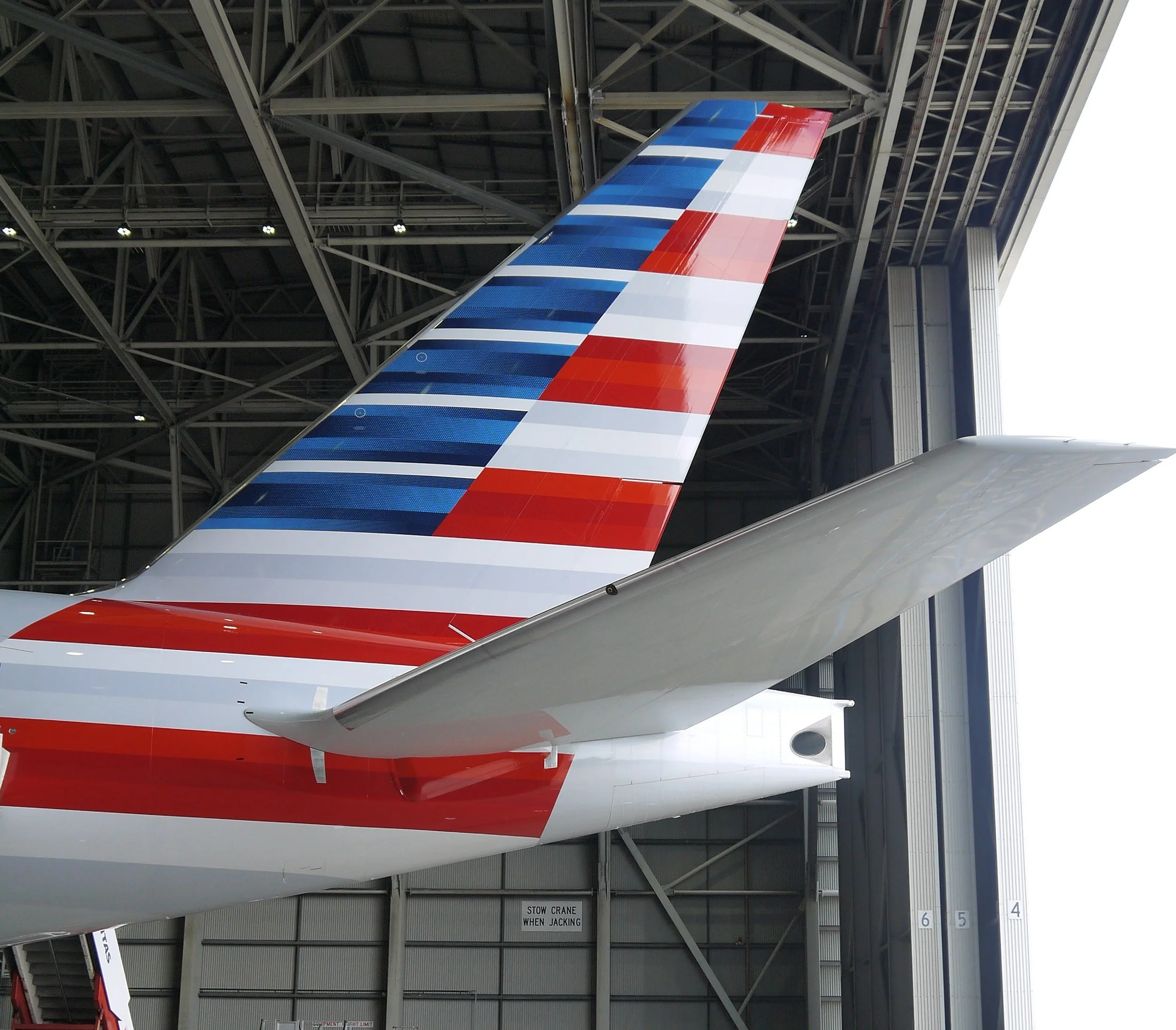  Shiny new painted tail of American Airlines Boeing 777 300ER, Registration N734AR. 