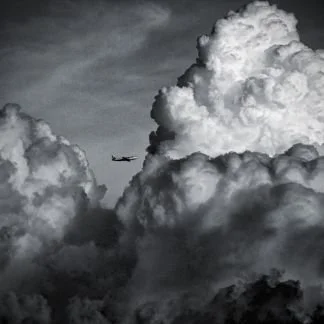  What causes turbulence? Thermal activity resulting in towering cumulonimbus clouds are areas of a high likelihood of turbulence. 